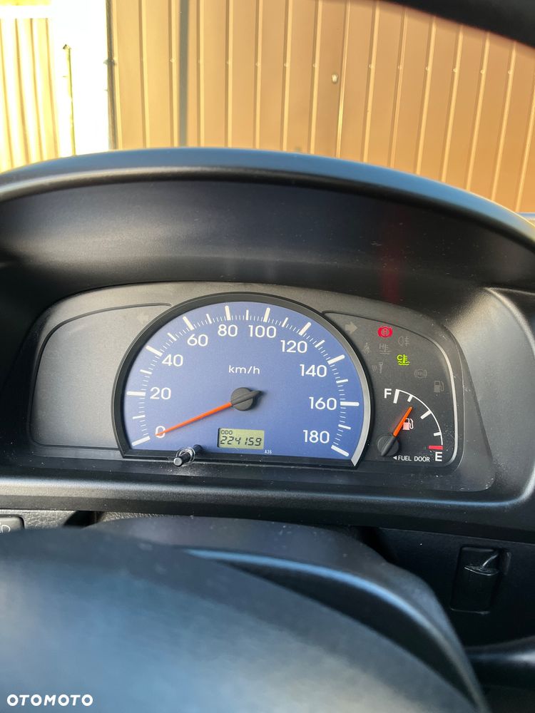 Daihatsu Cuore Top Edition 25 - 12
