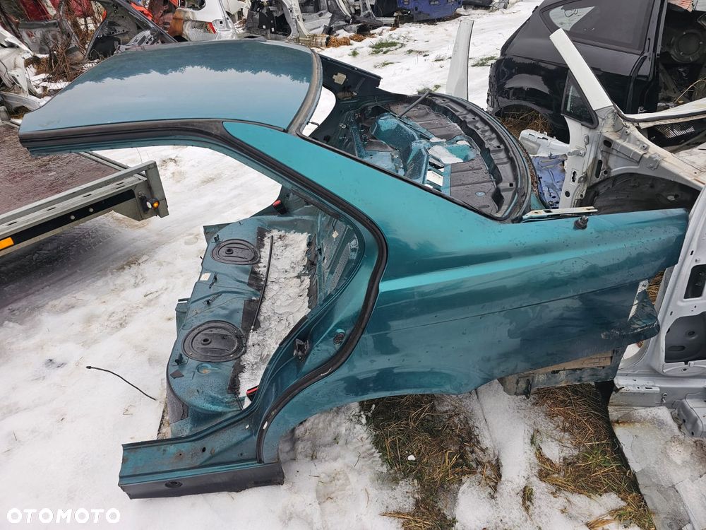 BŁOTNIK LEWY TYŁ ĆWIARTKA BMW E36 - 1