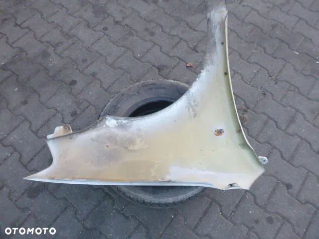 BŁOTNIK LEWY PRZÓD LEWY PRZEDNI DAEWOO KALOS KOLOR 95U - 10