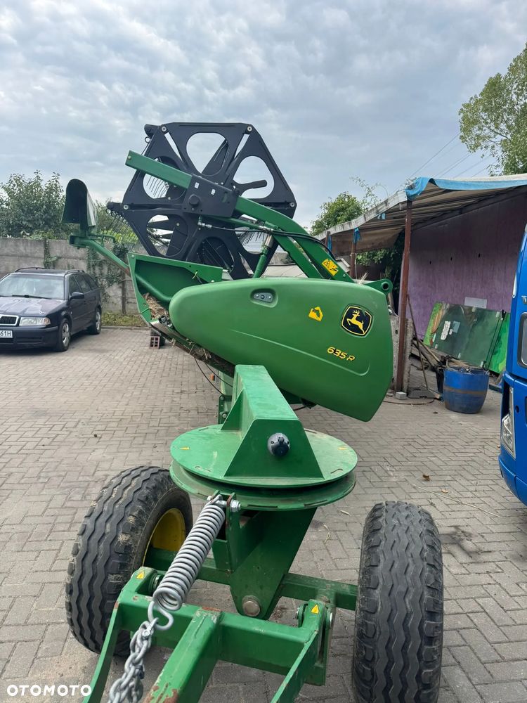 John Deere T670 - 23