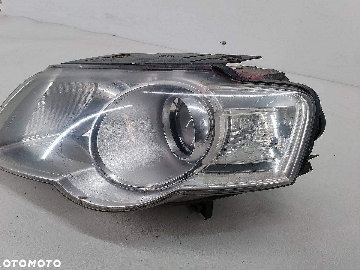 LAMPA PRZÓD LEWA VW PASSAT B6 3C0941005Q  1EL247014-11 - 2