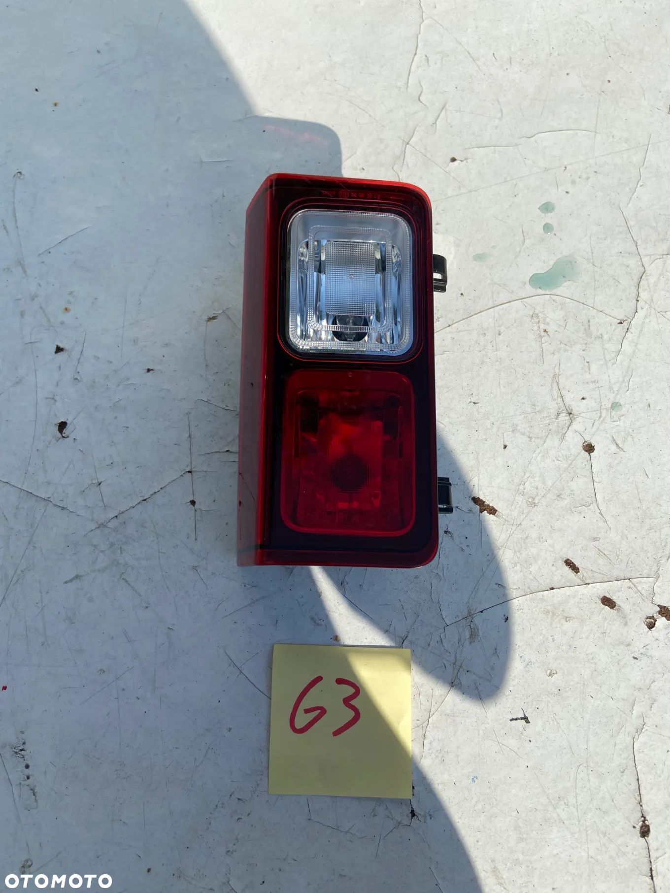RENAULT TRAFIC III LAMPA W ZDERZAK LEWY TYŁ ORYGINAŁ 265598248R - 1