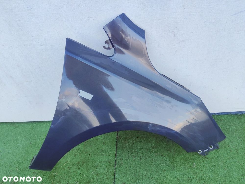 OPEL CORSA E BŁOTNIK PRZEDNI PRAWY - 1