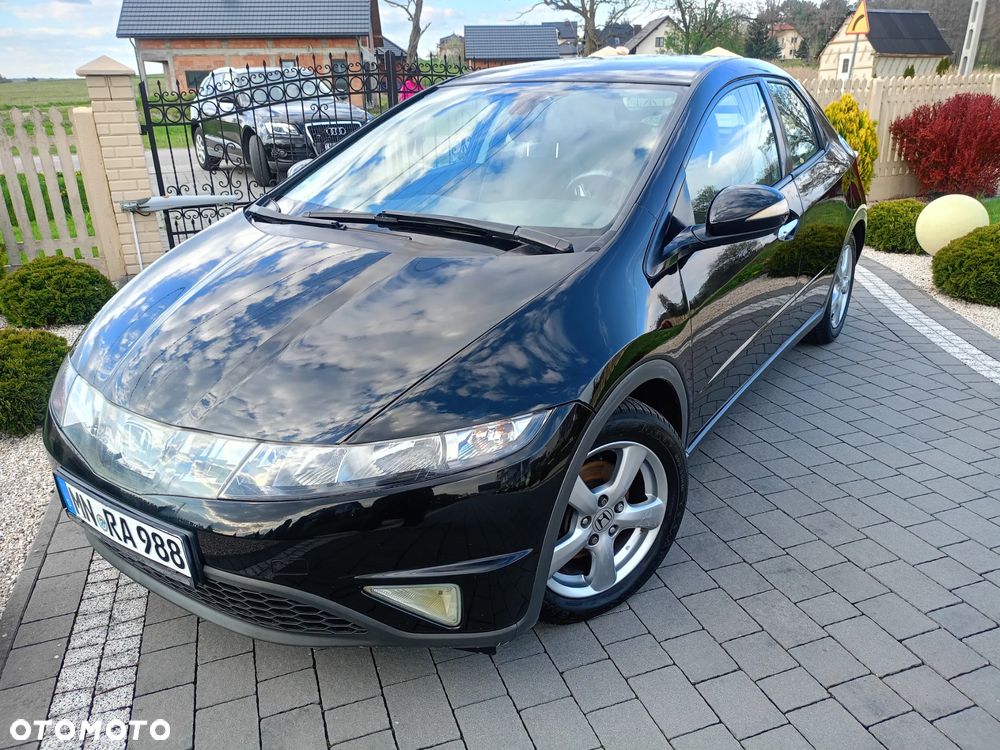 Honda Civic 1.4 Comfort - 1