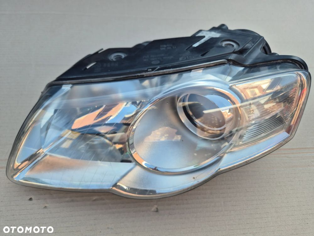 VW Passat B6 reflektor lewy.Valeo. 100%.2005-2010. - 1
