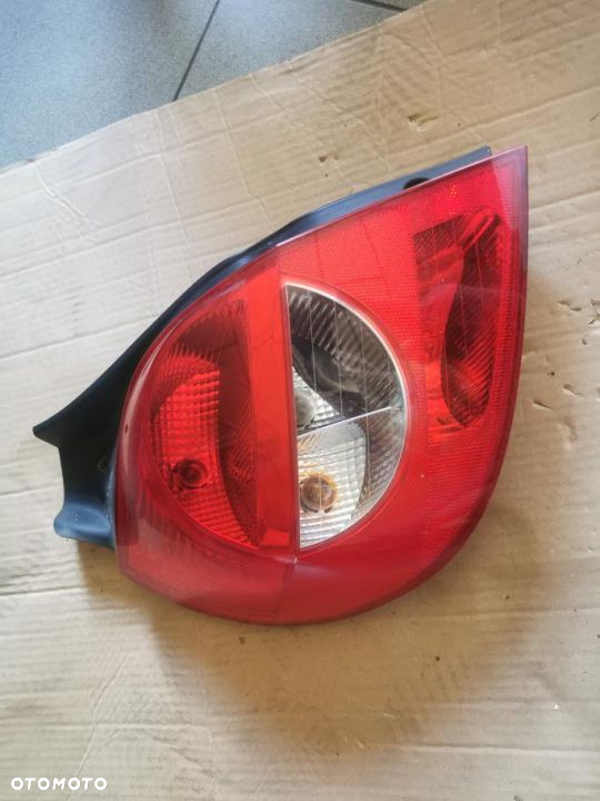 RENAULT CLIO III LAMPA LEWA TYŁ ORYGINALNA 05 06 R