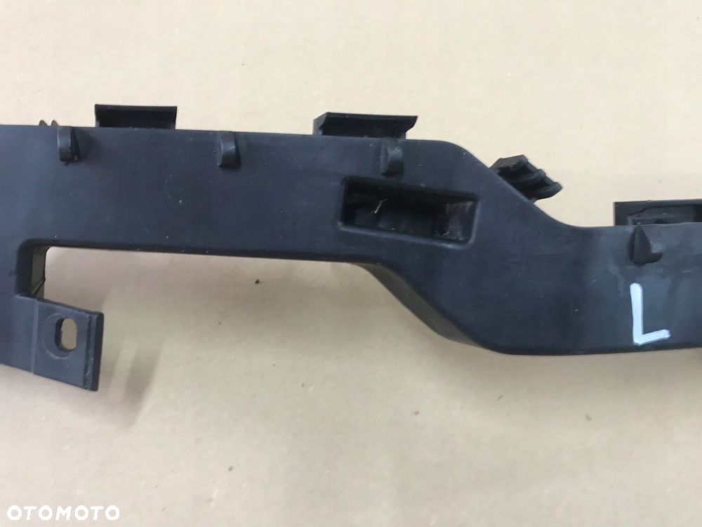 OPEL MERIVA B ŚLIZG WSPORNIK POD LAMPĘ PRAWY LUB LEWY GM - 4