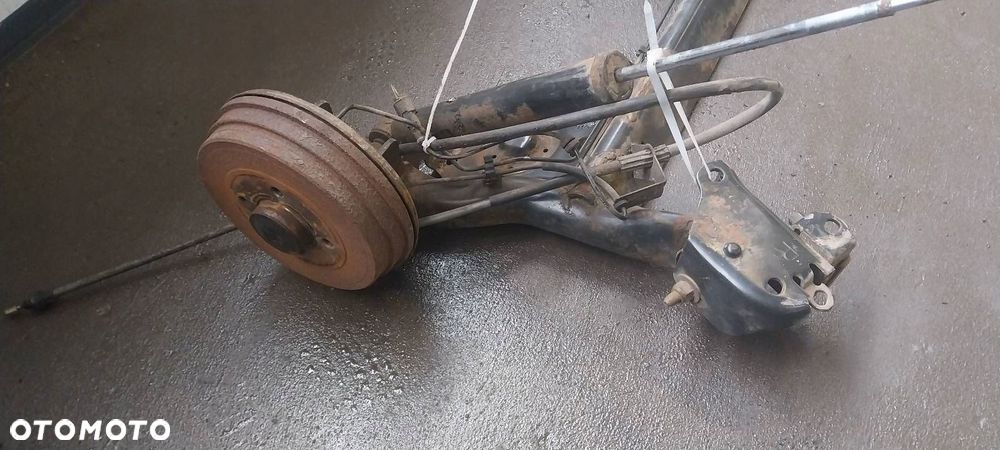 BELKA OŚ ZAWIESZENIA TYŁ BĘBNY Z ABS RENAULT CLIO III 1.5 DCI - 4