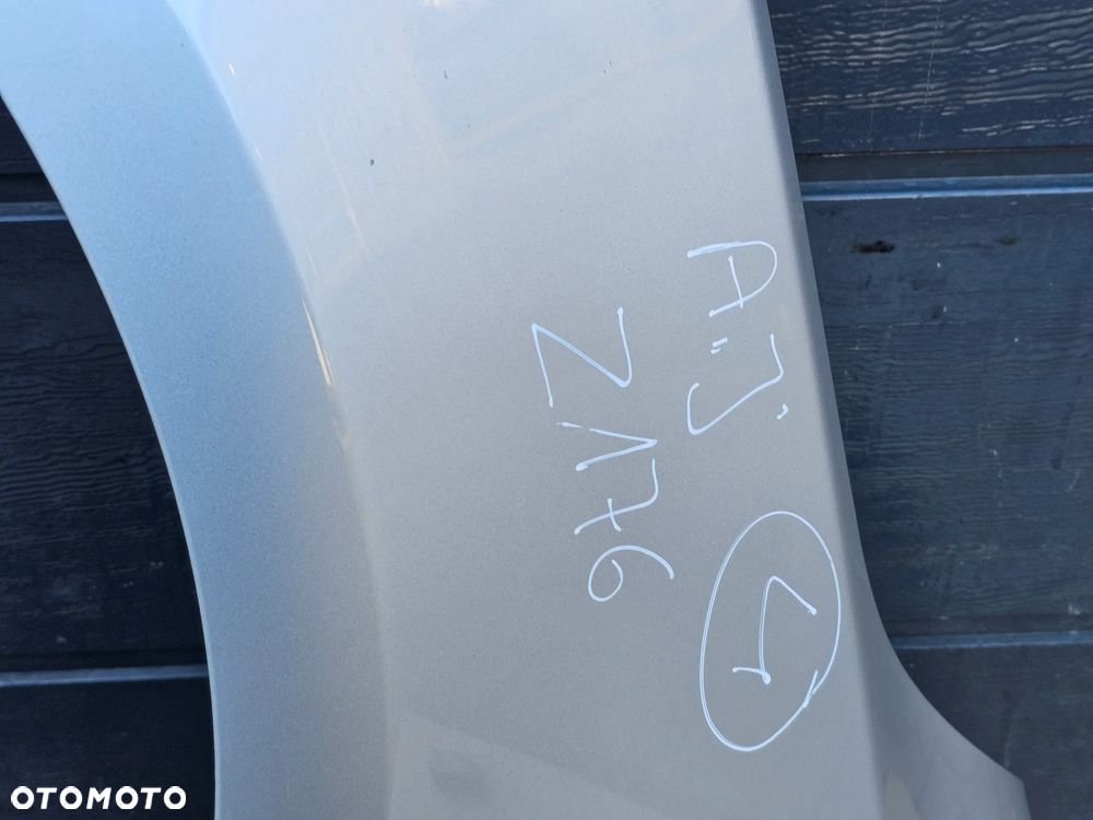 BŁOTNIK LEWY PRZÓD PRZEDNI OPEL ASTRA J Z176 ZE ŚLIZGIEM - 4
