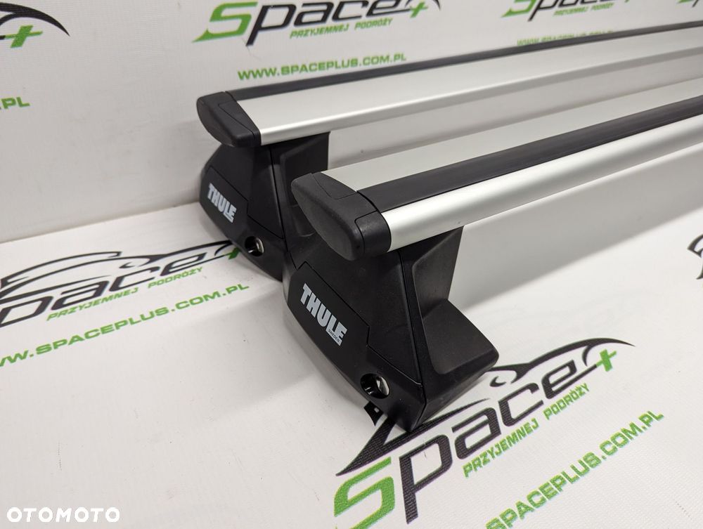 Bagażnik dachowy Thule: belki 960 + Stopy 7105 + kit - 2