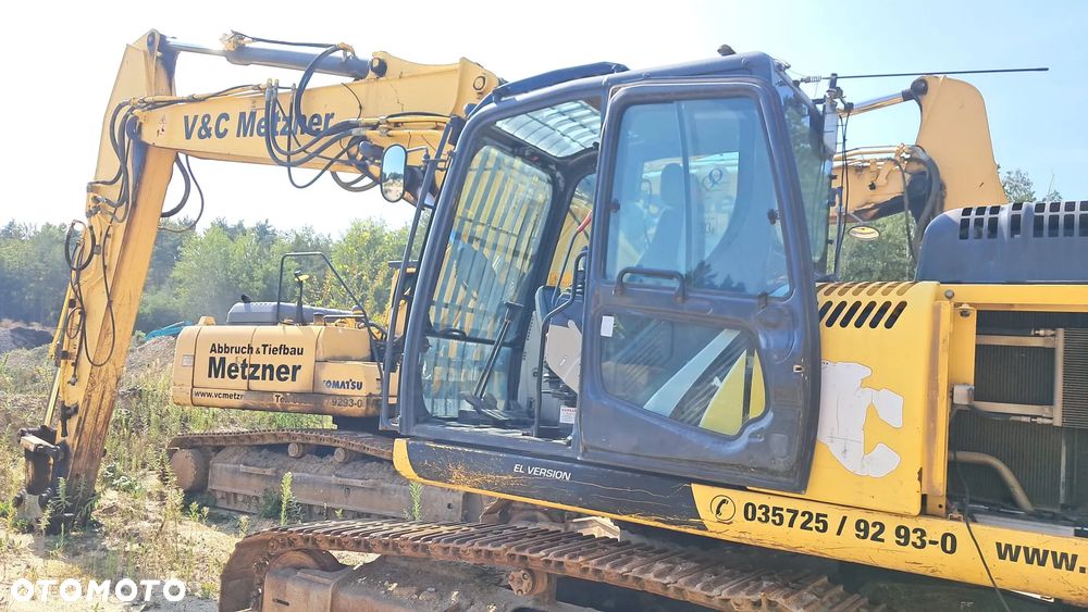 New Holland E 265 C - 1