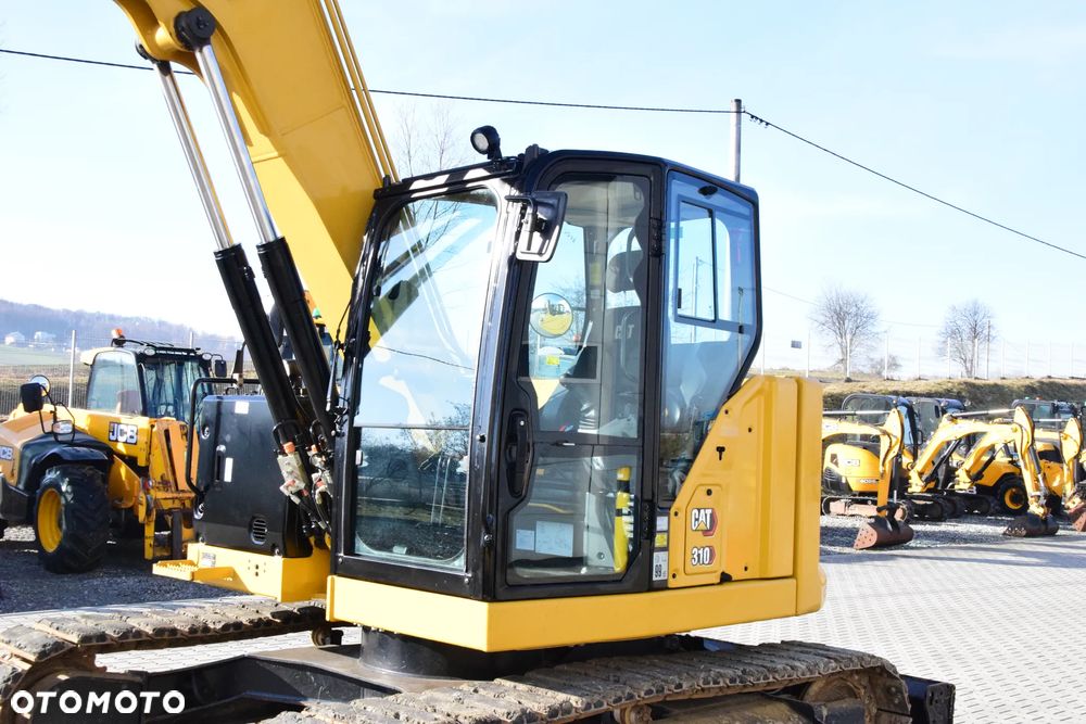 Caterpillar 310 - 8