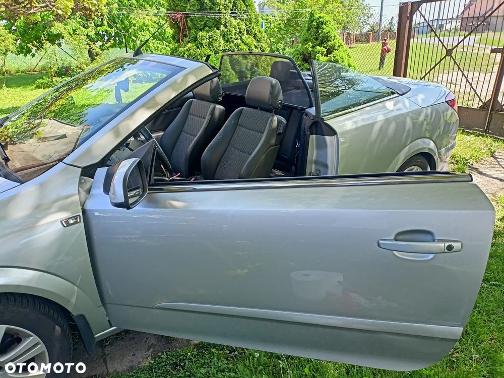 Opel Astra 1.8 Cosmo - 25