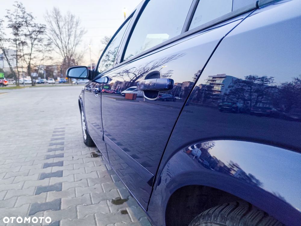 Opel Astra 1.6 Cosmo - 8