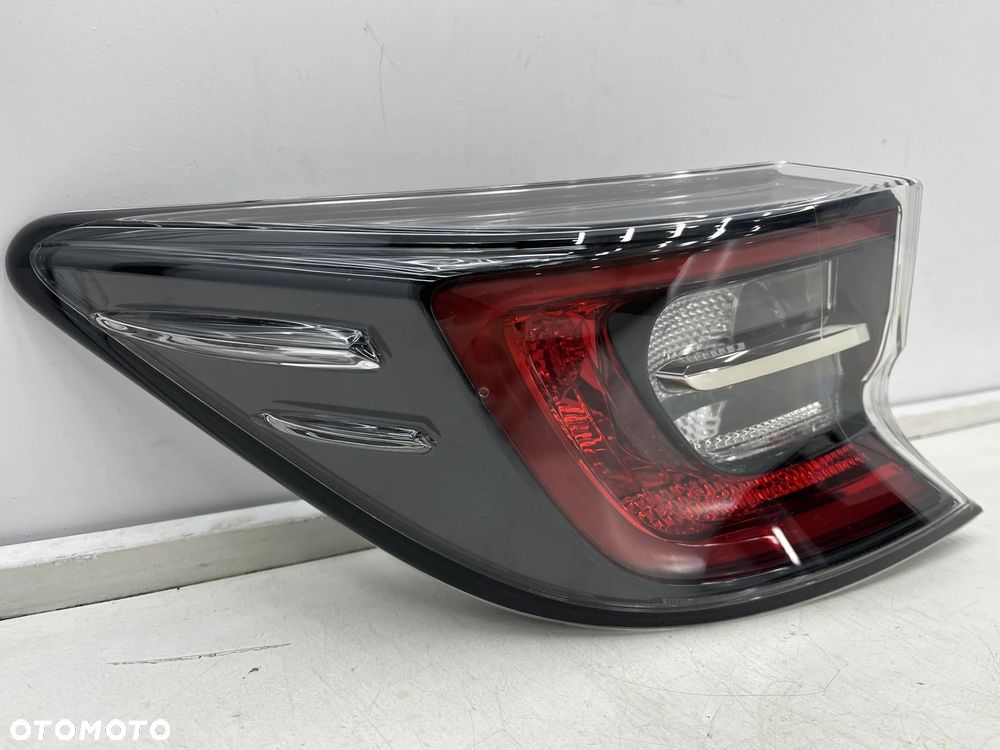 Lampa Toyota Corolla XII E21 18-22r. HB hatchback NOWA lewa tylna LED w błotnik EU Oryginalna lewy t - 2