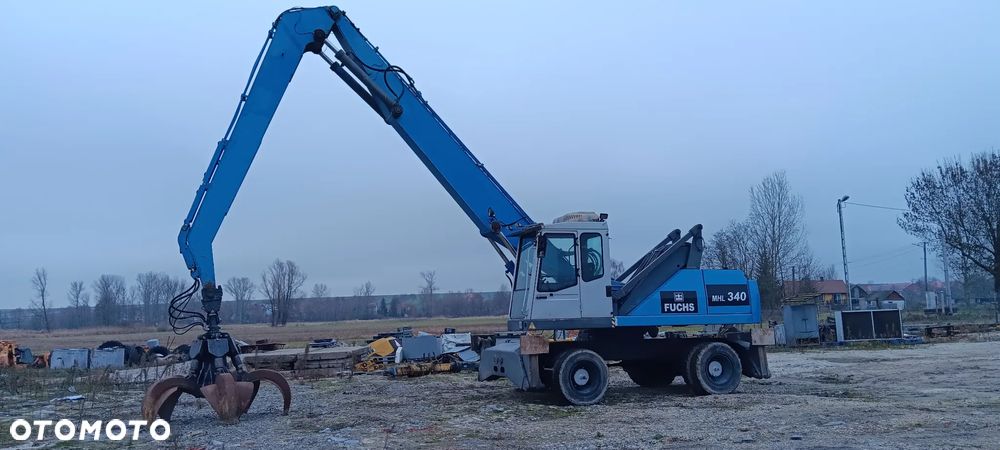 Fuchs MHL 340 Przeładunkowa do Złomu Podnoszona kabina - 1