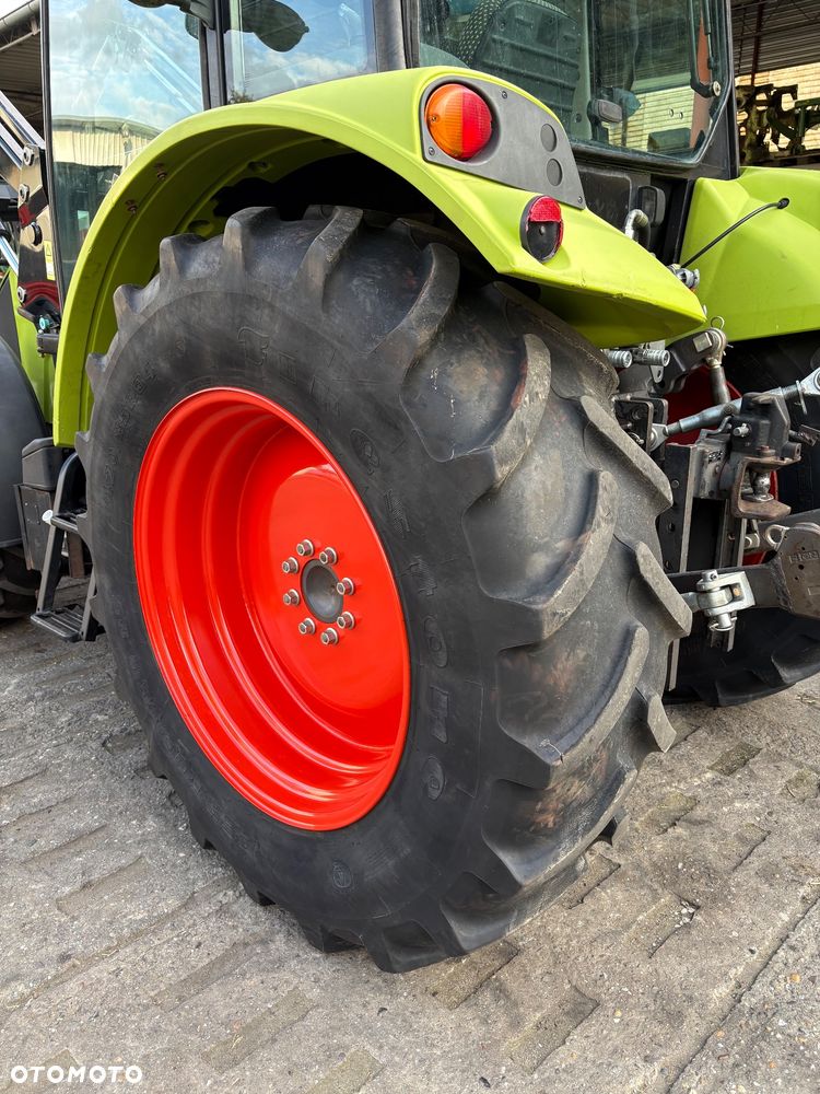 Claas Axos 310 + ładowacz - 13