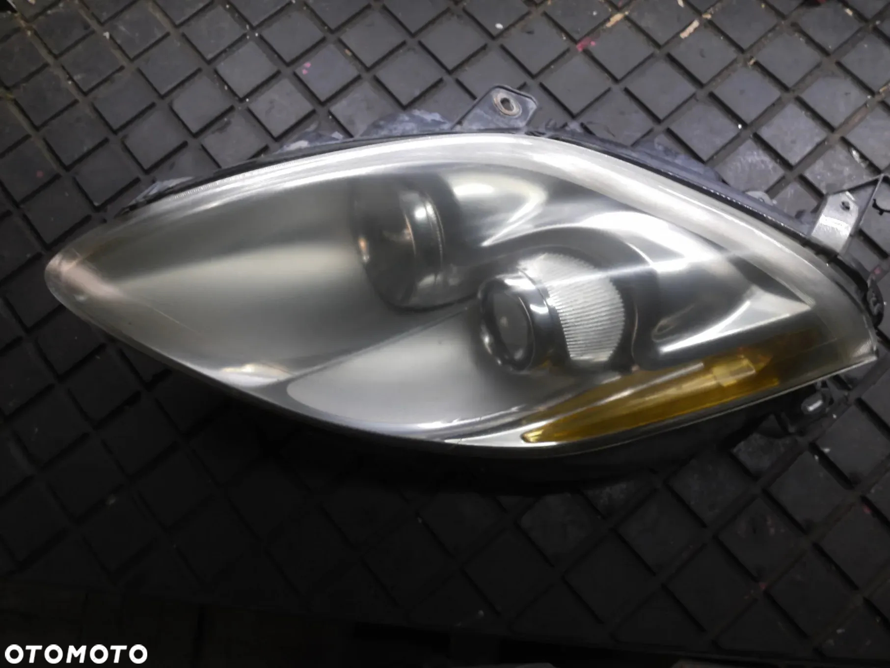 REFLEKTOR LEWY PRZÓD FIAT BRAVO II 51757538 LAMPA EUROPA POSIADAM 2SZT - 6