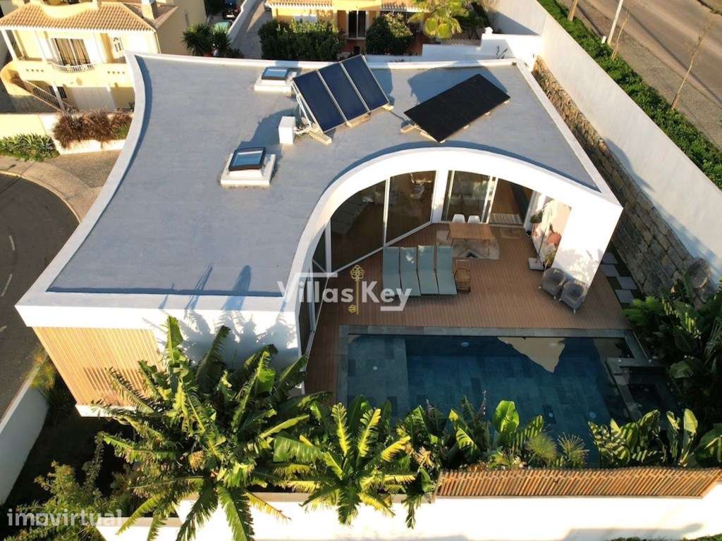 Moradia contemporânea com piscina e perto da praia para venda em Lagos - Grande imagem: 2/28