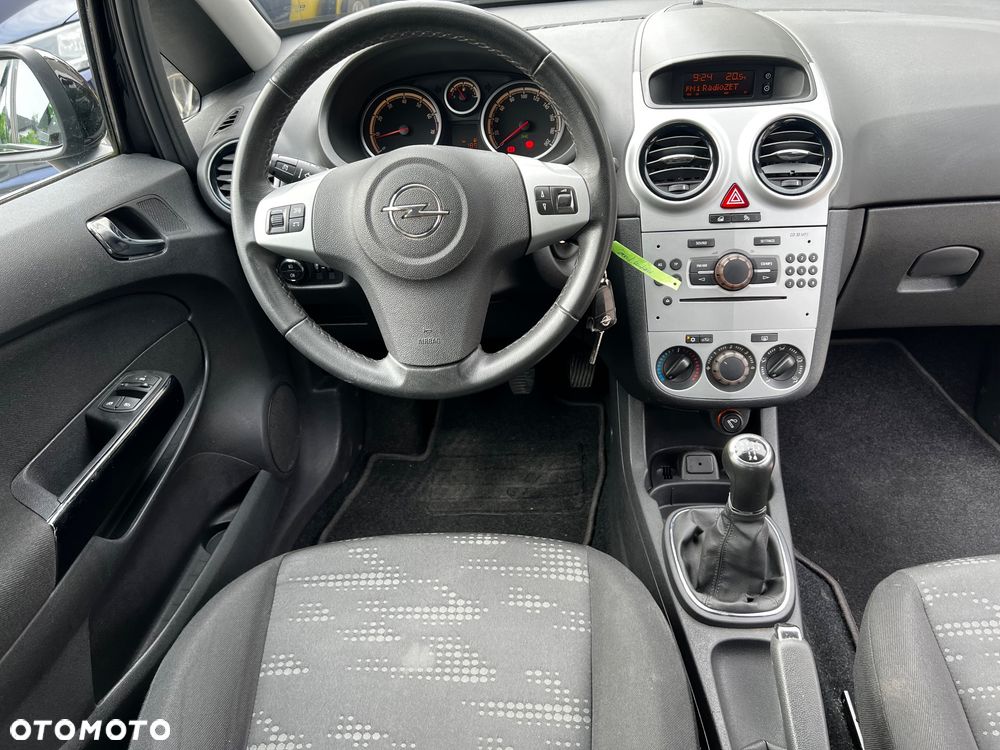 Opel Corsa 1.2 16V Enjoy - 21