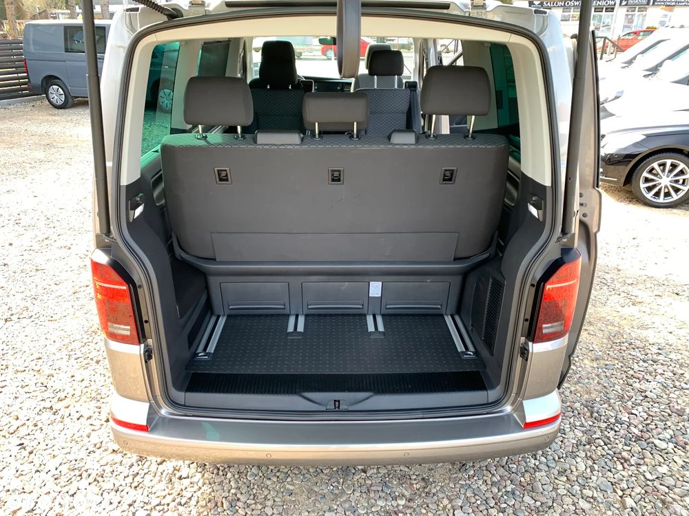 Volkswagen TRANSPORTER T6.1, DSG 4Motion, T6 4x4 plus reduktor napędów, Model BULLY MULTIVAN DELUX ORYGINAL, Światła LED, Fotele obracane kapitańskie, Dynamiczne zawieszenie komfortowe, 3 strefowa klimatyzacja, Felgi specjalne, Pakiet akustyczny, Stolik CAMPER - 21