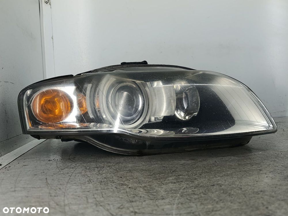 LAMPA PRZÓD PRAWA XENON AUDI A4 B7 8E0941004AM   0301219272 AL - 7