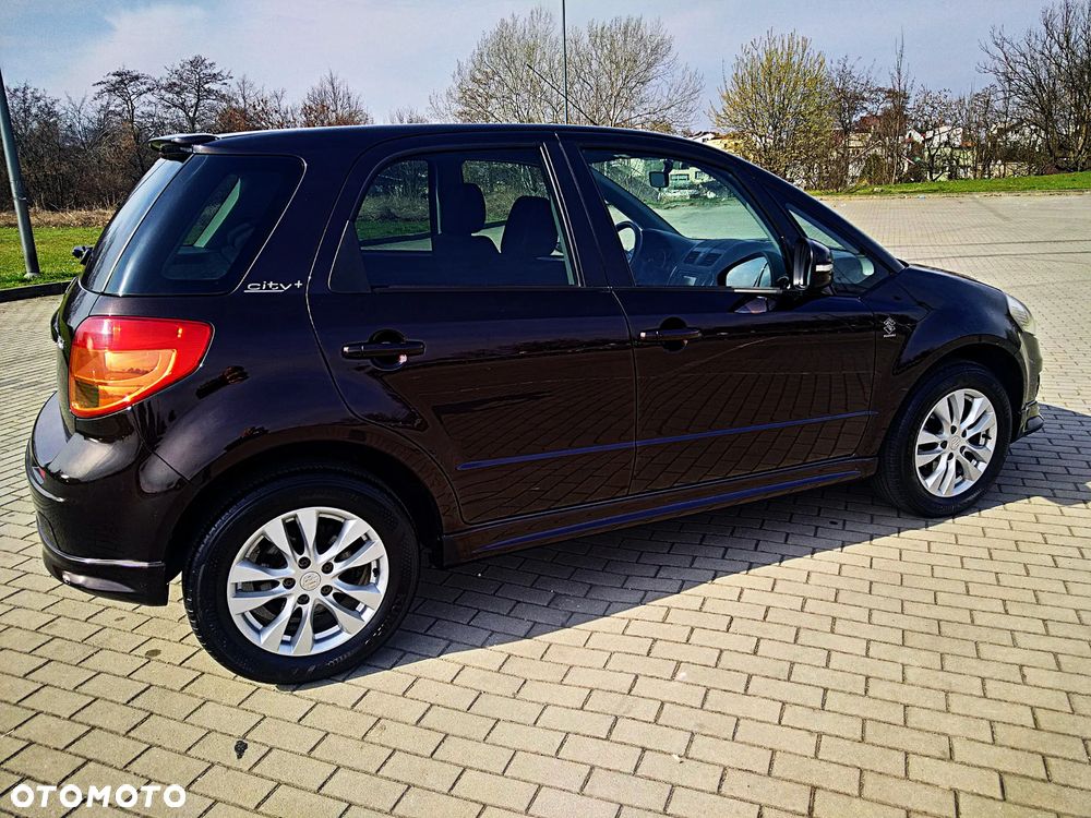 Suzuki SX4 1.6 Comfort Plus - 13