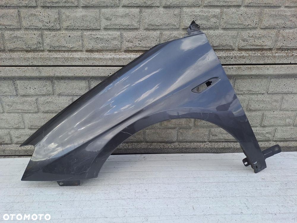 lancia delta 08-14 błotnik przedni lewy oryginał - 1