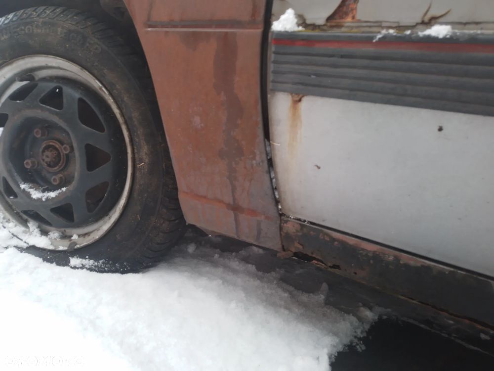 OPEL KADETT E LIFT 89-91    OSŁONA PRZECIWSŁONECZNA PRAWA LEWA - 21