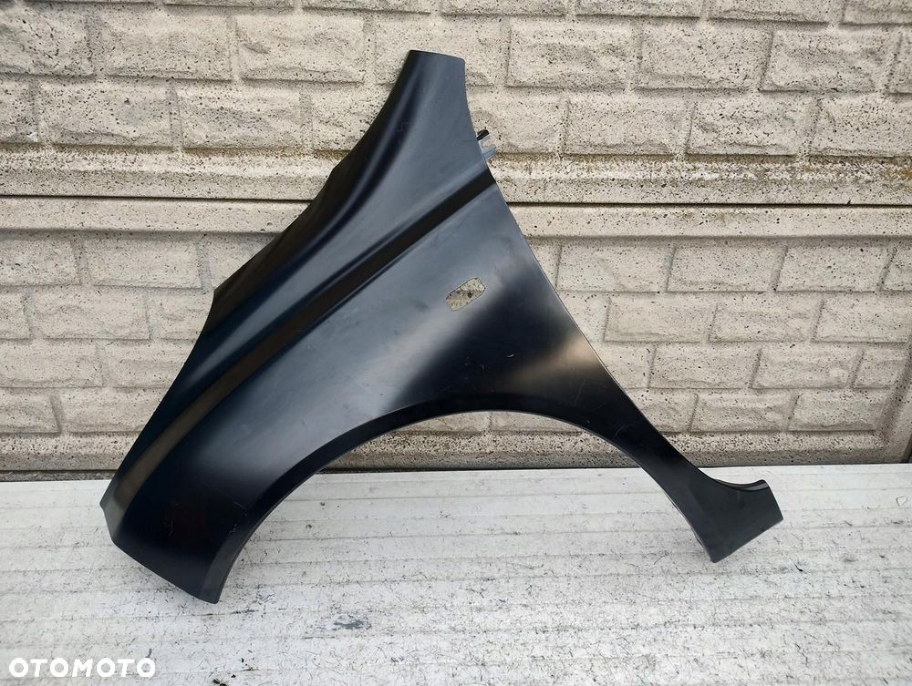 nissan micra k12 03-10 błotnik przedni lewy oryginał - 1