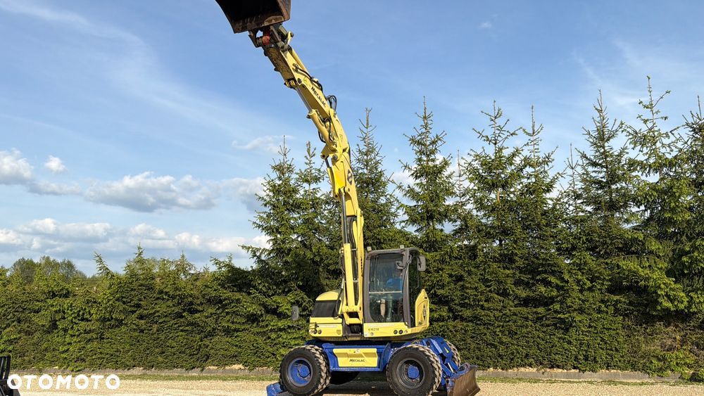 Mecalac Koparka 14 ton MECALAC 15 MWR koparko-ładowarka 3 łyżki widły 1 wł Centr.smarowanie Opony na BLIŹNIAKU 80%Camso ładowarka 714 12MTX 4x4 skrętne KLIMA kabina Premium silnik 146KM volvo EW140B DEUTZ szybka 35km/h - 36