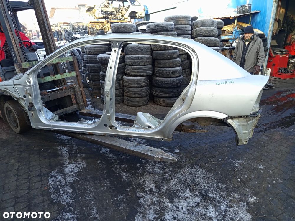 BŁOTNIK TYLNY LEWY LUB PRAWY OPEL ASTRA II G 5D - 4