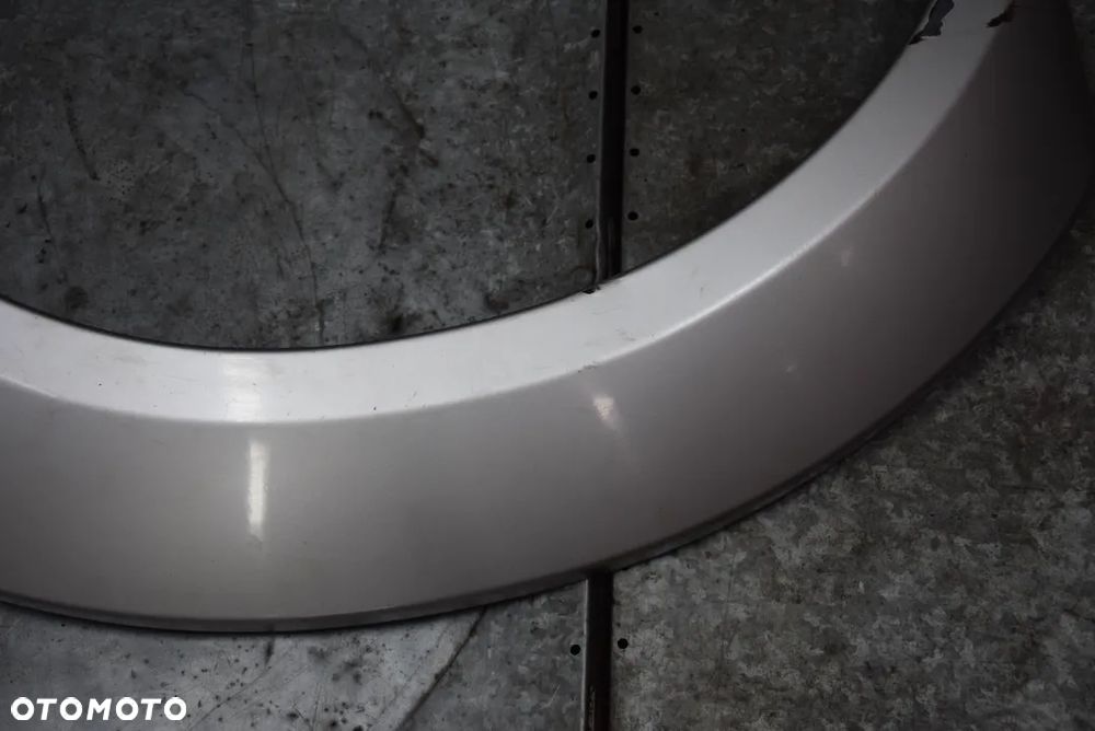 NISSAN NAVARA D22 LISTWA BŁOTNIKA LEWA  TYŁ 4D - 4