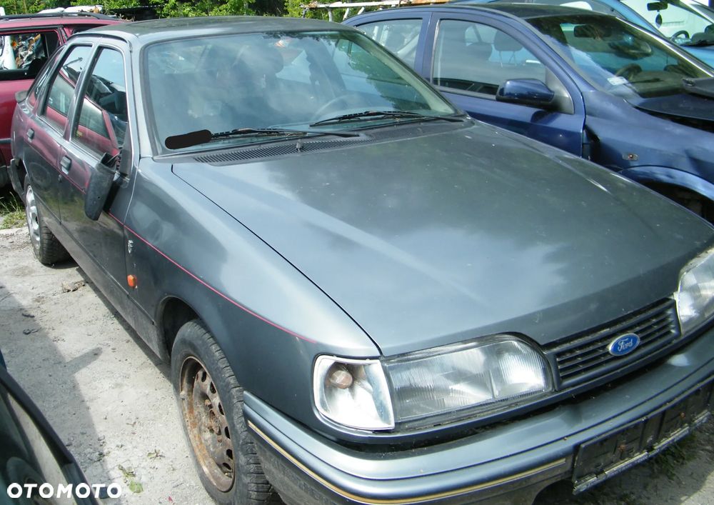 Ford Sierra (91-93r.) 2.0B 115KM. Silnik N9E Skrzynia A4LD lakier Polaris Grey. Cały na części GWARANCJA !!!  Przód Tył Zestaw Komplet Drzwi Klapa Zderzak Błotnik Maska Grill Atrapa Szyba Pas Lampa Lusterko Boczki Fotel Kanapa Kokpit Deska Rozdzielcza Przełącznik Włącznik Sterownik Przewody Wiązka Instalacja Moduł Komputer Czujnik Listwa Pompa Alternator Wtryski Głowica Rozrusznik Kompresor Sprzęgło Dwumas Silnik Skrzynia ABS Klimatyzacji Paliwa Wspomagania Kolektor Turbina Przepustnica Zawór Chłodnica Koło Hak Belka Sanki Zawieszenie Mcpherson Półoś Amortyzator Wydech Tłumik Zacisk Most - 3