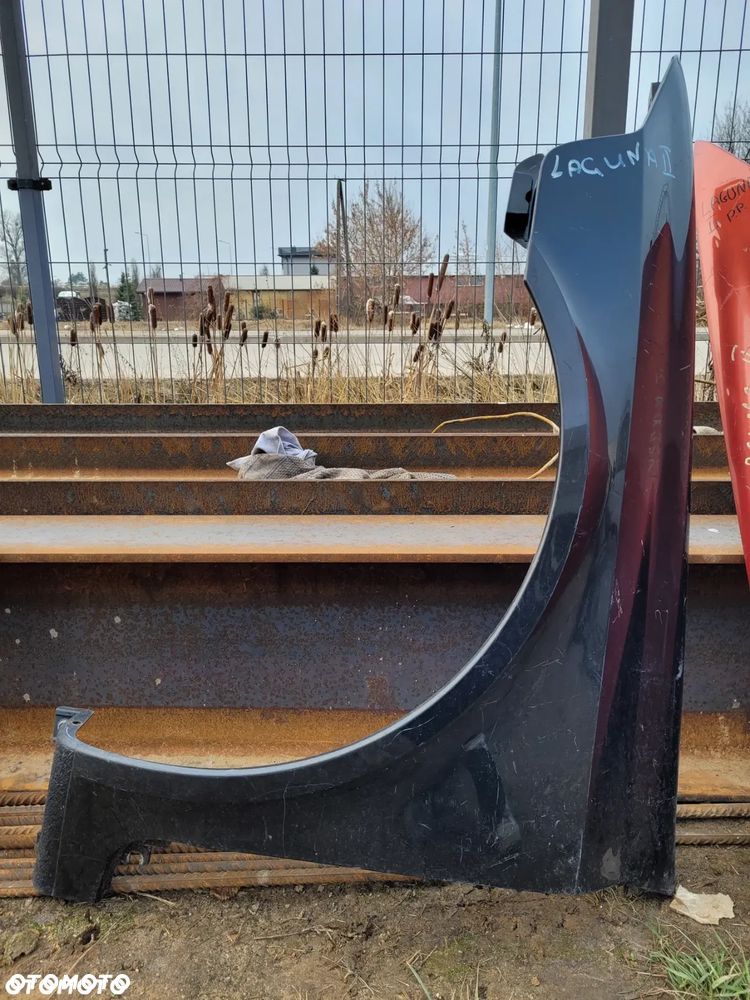 BŁOTNIK LAGUNA II PRAWY LEWY PRZÓD - 13