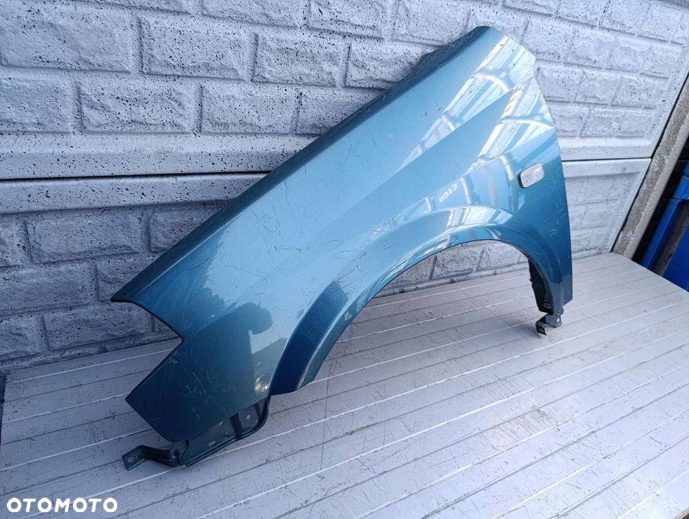 NISSAN PRIMERA BŁOTNIK LEWY PRZÓD - 2