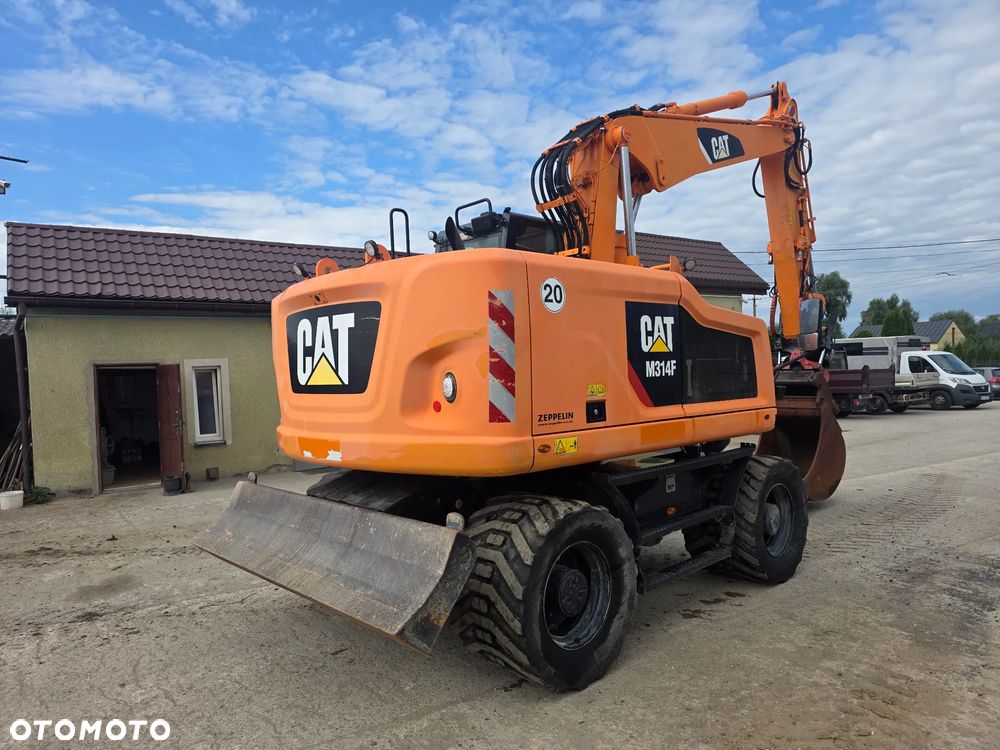 Caterpillar Cat M314F Rototil z Niemiec - 4