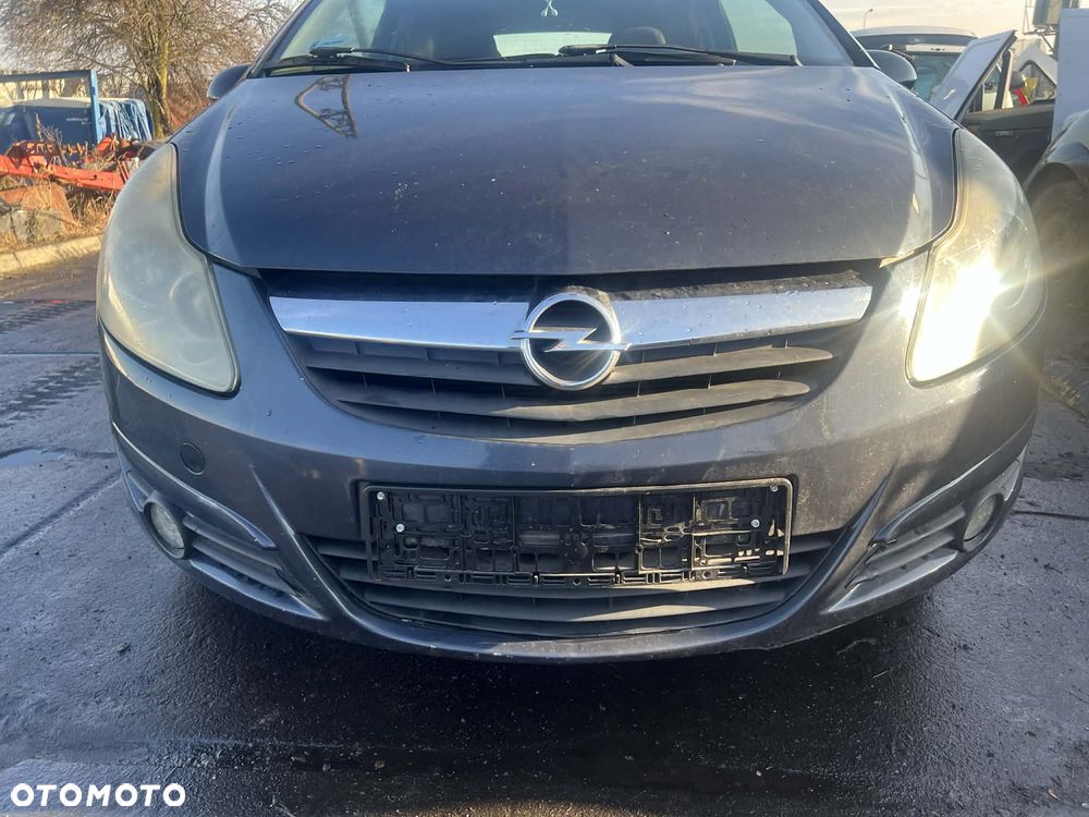 Zderzak przedni KOMPLETNY Opel Corsa D !! brak kodu lakieru !!