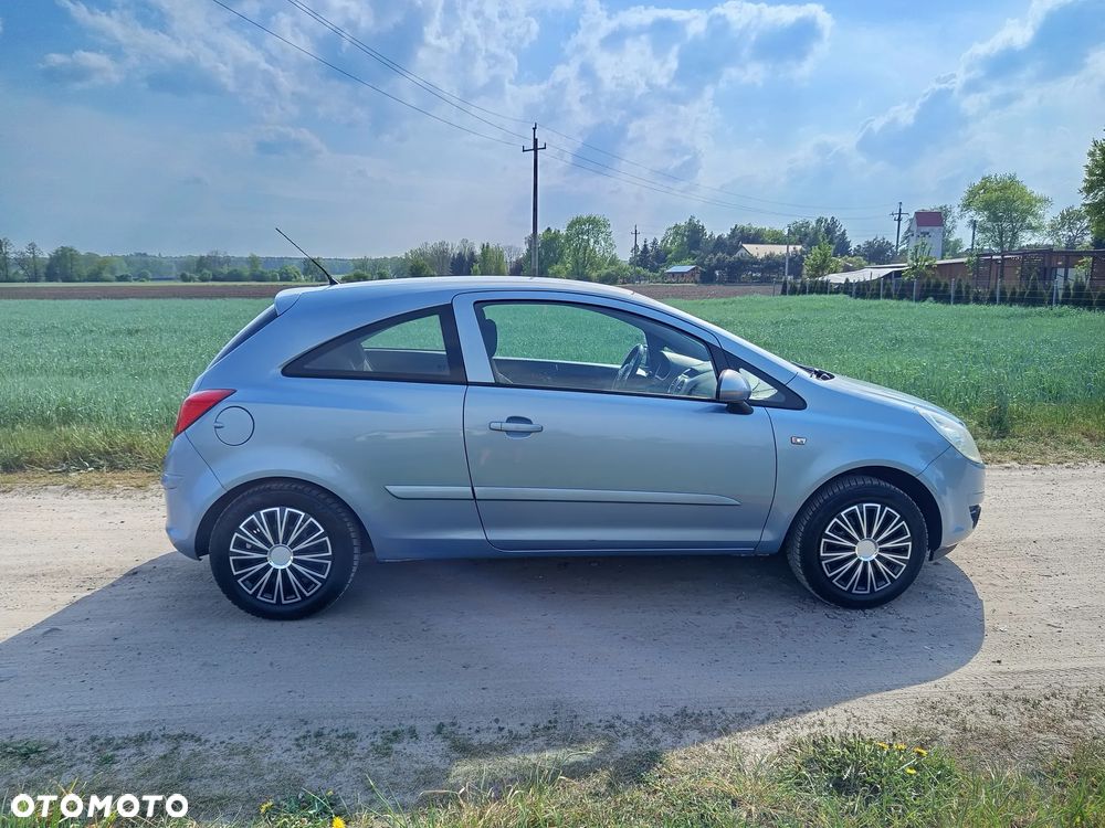 Opel Corsa 1.2 16V Cosmo - 11