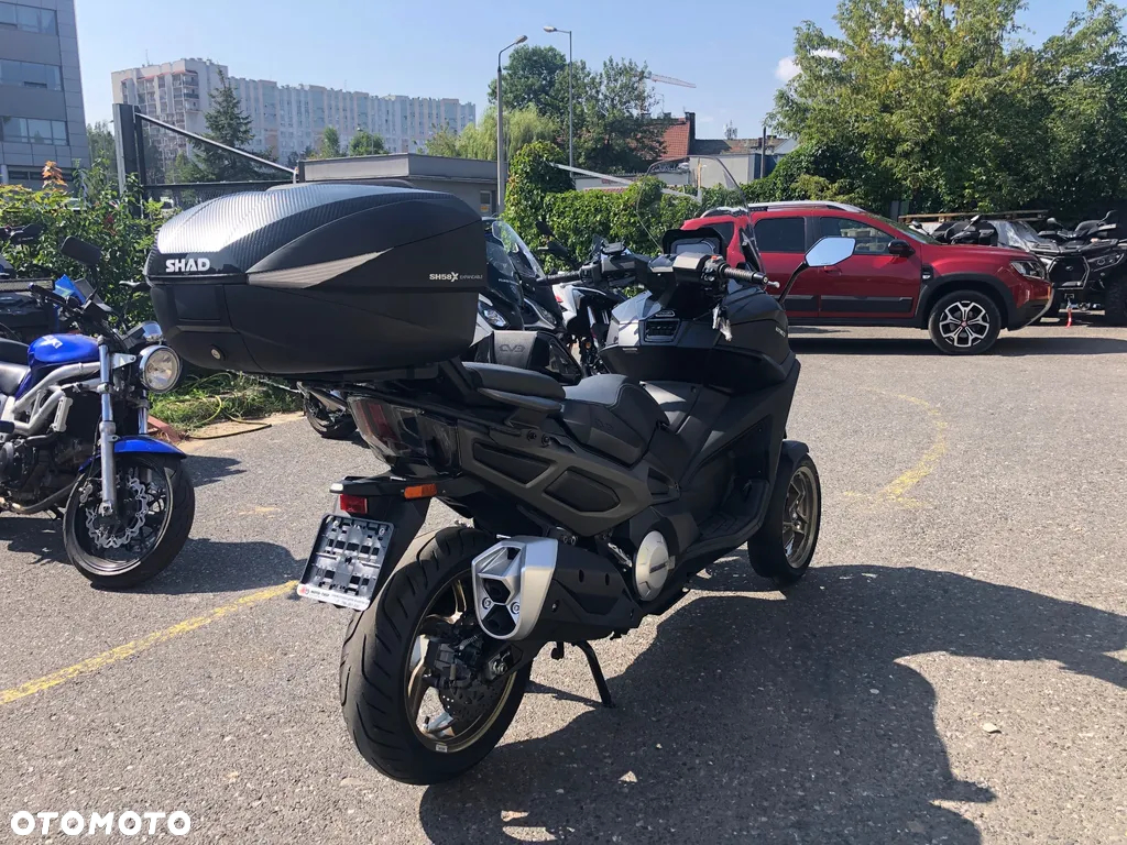 Kymco CV3 - 4