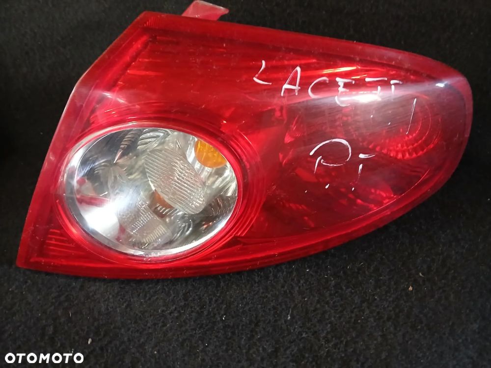 Chevrolet Lacetti 2007 rok Lampy tylne w błotnik lewa, prawa - 9