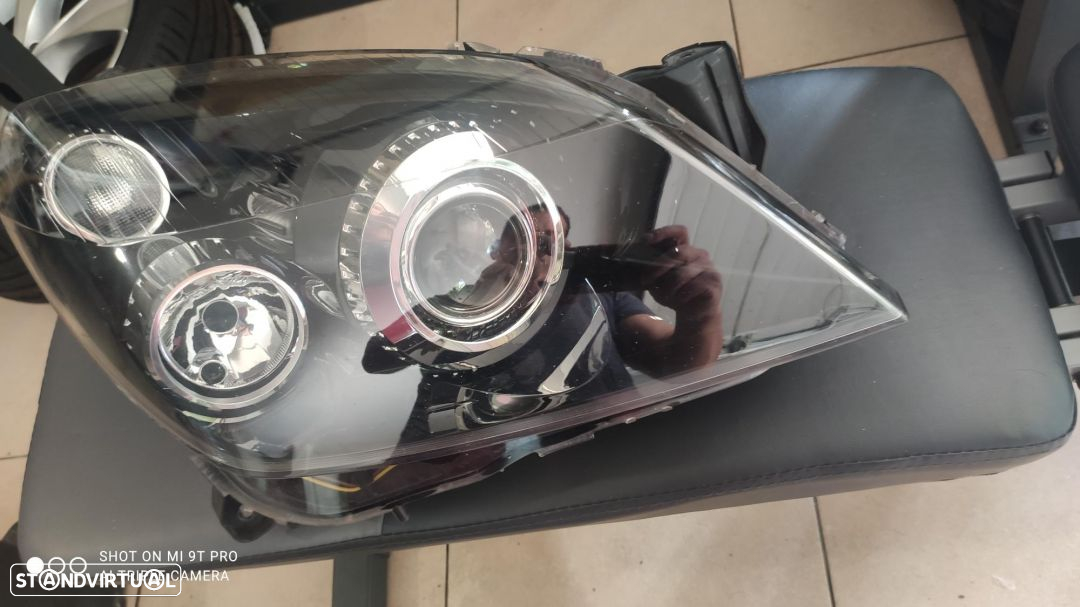 farol direito xenon Astra H - 2