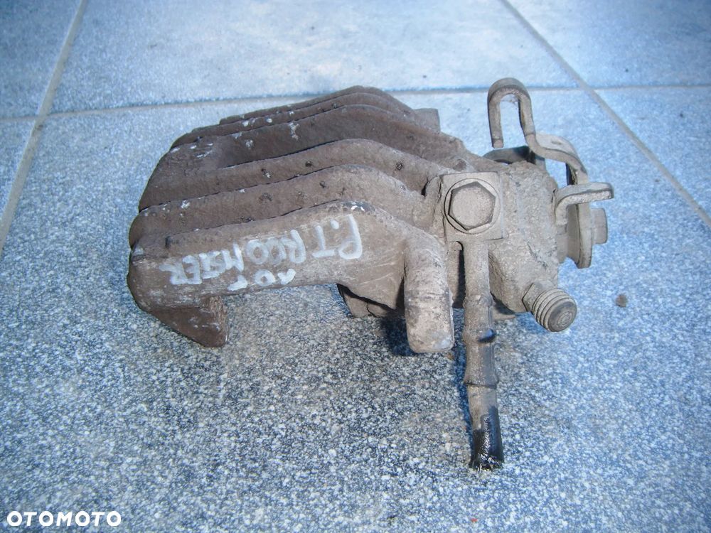 skoda roomster 10r  zacisk prawy tył