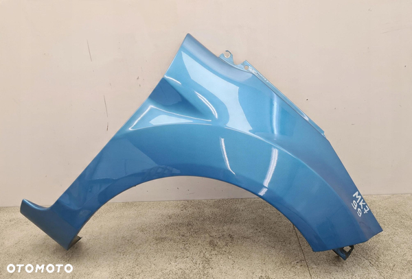 FORD FIESTA MK7 BŁOTNIK PRAWY PRZÓD 99