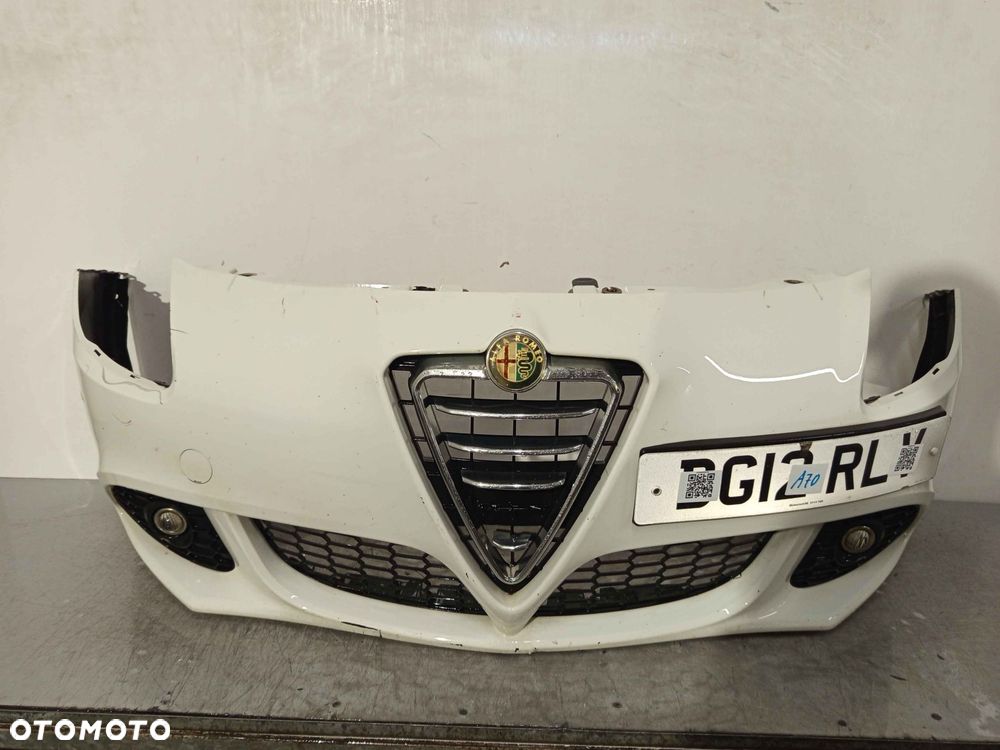 ^ ZDERZAK PRZÓD PRZEDNI ALFA ROMEO GIULIETTA 296/A 296 BIAŁY HALOGENY