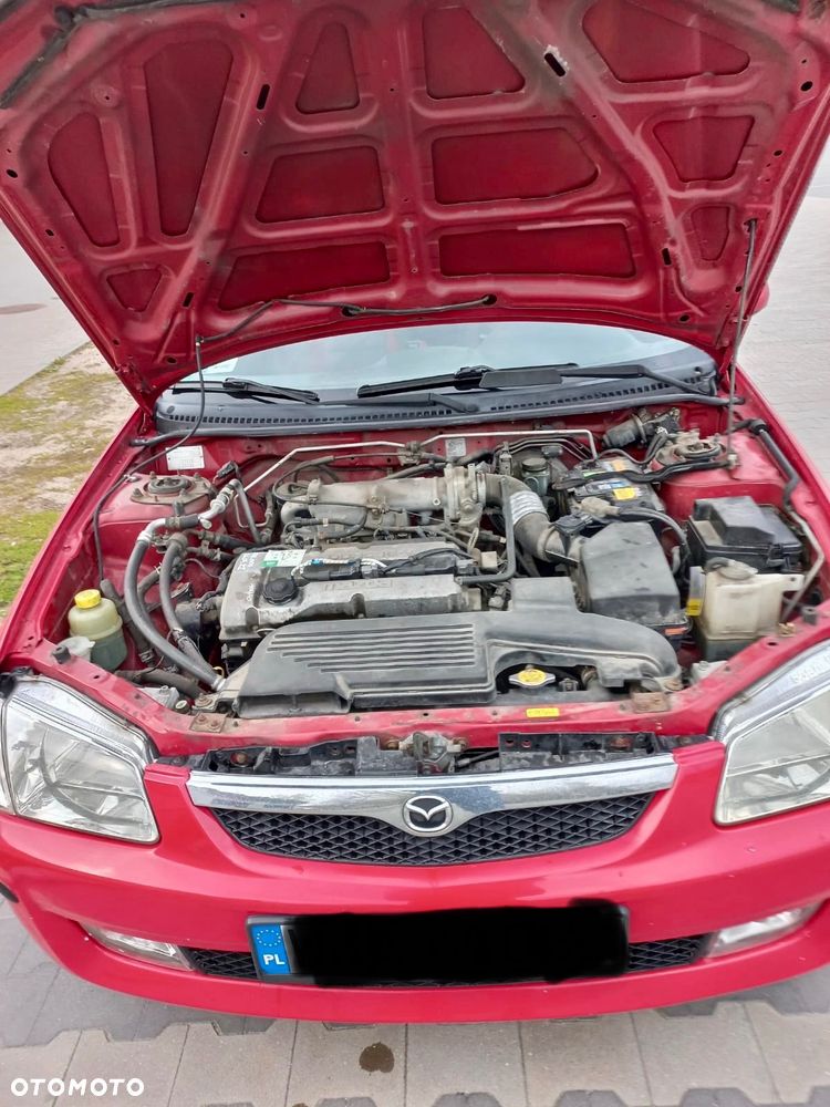 Mazda 323F - 14