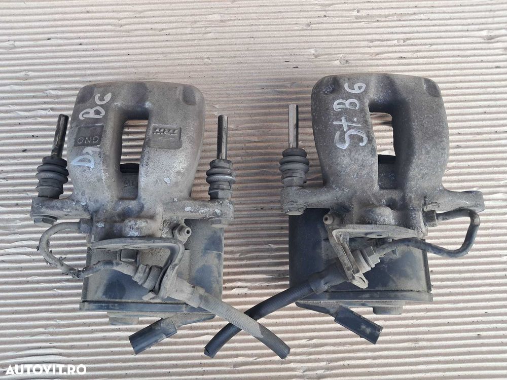 Vw Passat B6, set etrieri spate originali, modelul cu motoras - 1
