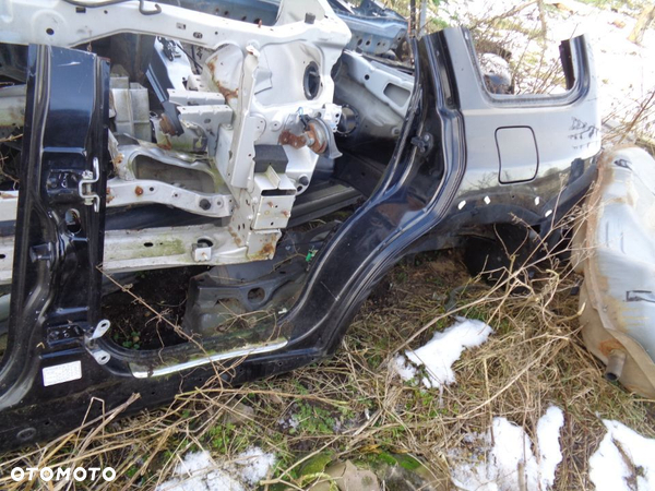 MAZDA TRIBUTE BLOTNIK PROG SLOPEK LEWY zdrowy bez rdzy czesci