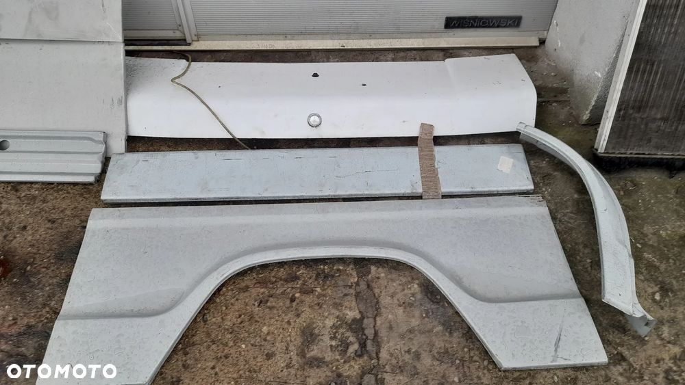 BłOTNIK TYLNY LEWY PRAWY MERCEDES KACZKA T1 - 1