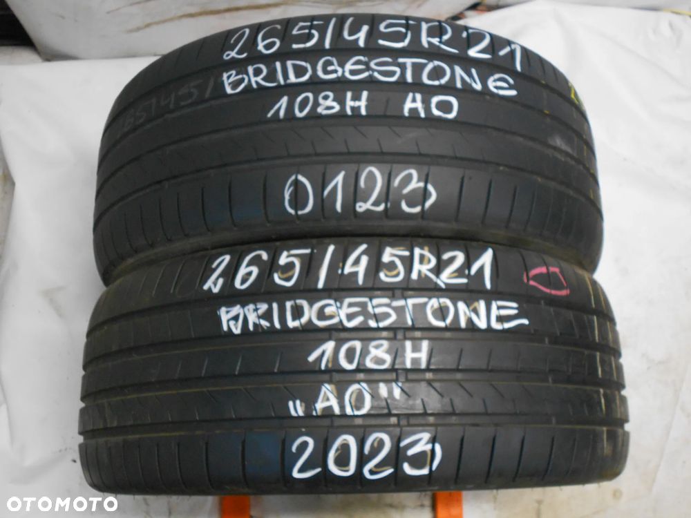 OPONY  265/45R21 BRIDGESTONE ALENZA 001 AO DOT 2023 8MM - 1